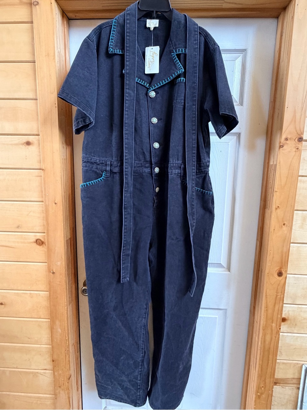 Cooperative Black Short-Sleeve Jumpsuit with Contrast Stitching